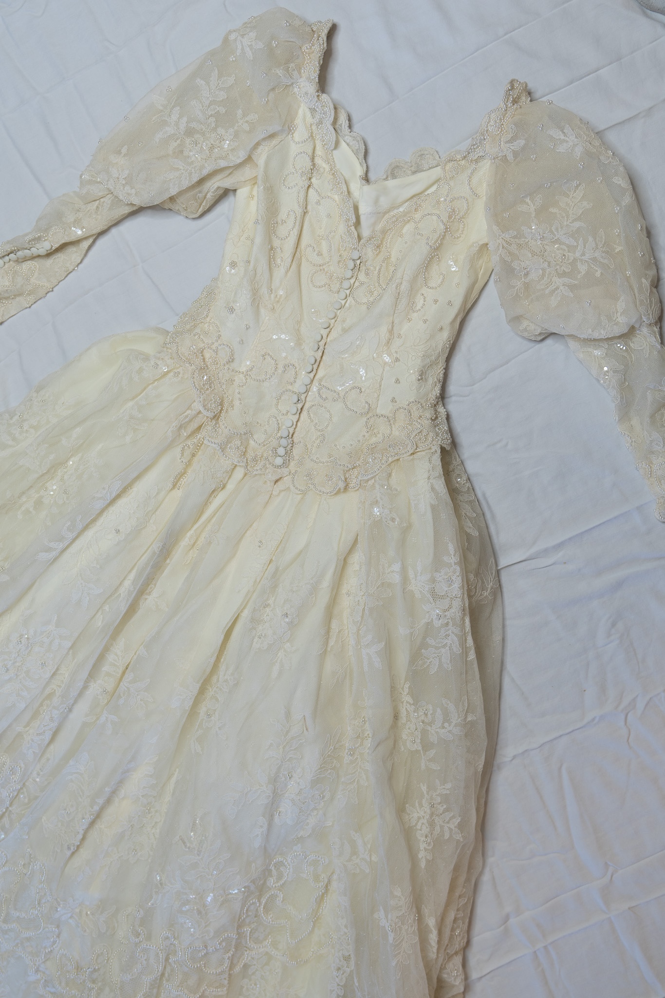 Elegant wedding dress with intricate lace and beadwork